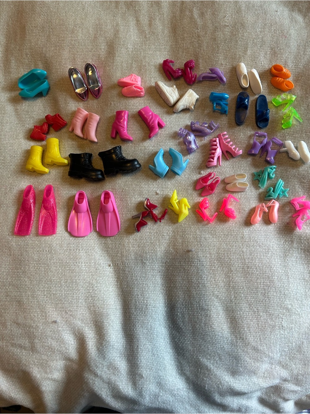 Lot of Barbie and other doll shoes